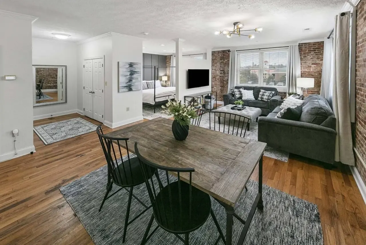 Open living space and kitchen in the Bricks Over Broadway loft