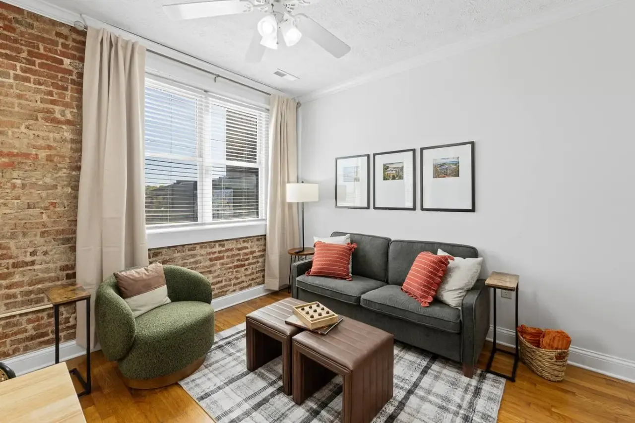 Exposed-brick living room in Scot’s Suite