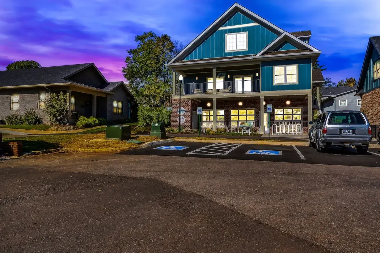 Greenway Village building at dusk